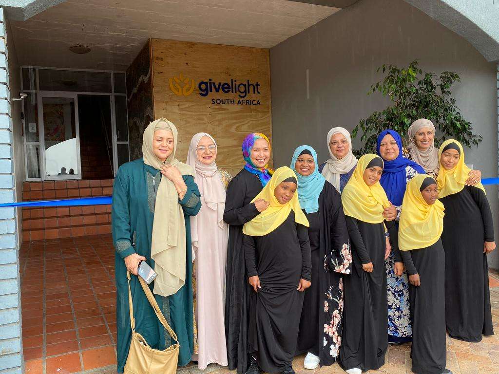 group photo in front of building