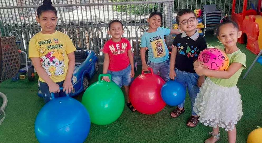 Children playing wiith balls